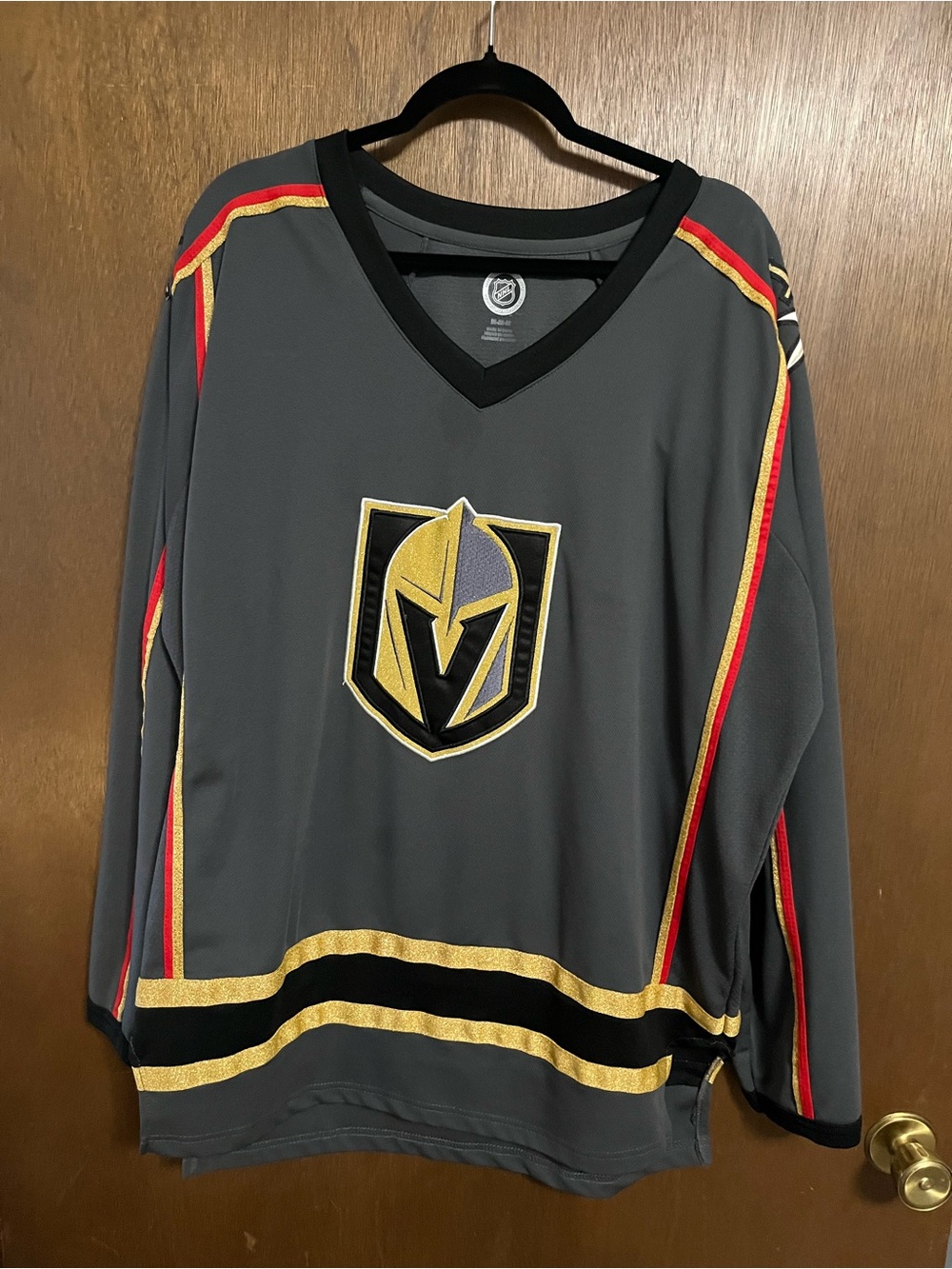 NHL Men's Gray Jersey with Gold and Red Trim